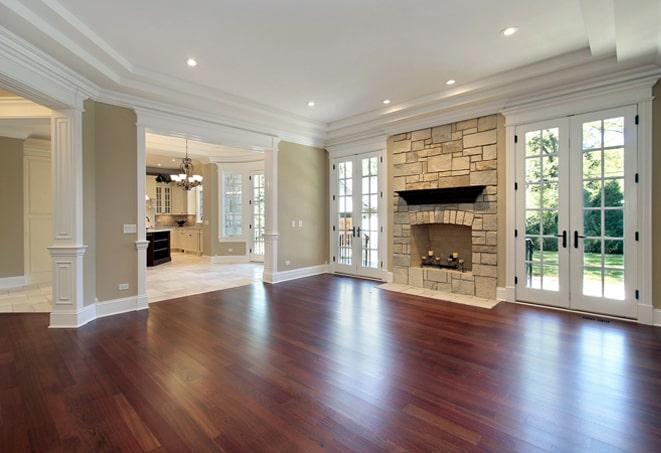 brightly lit room with shiny hardwood floor